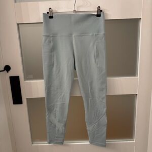 Athleta Salutation Stash Mesh Tight Size M